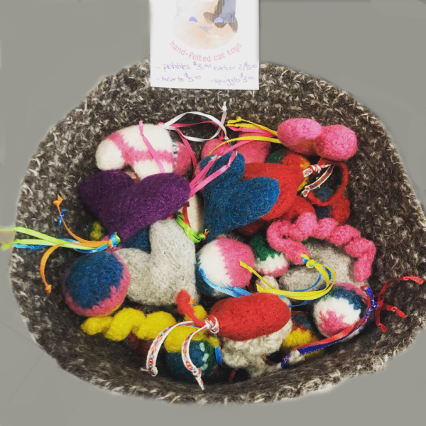basket full of kitty pebbles cat toys
